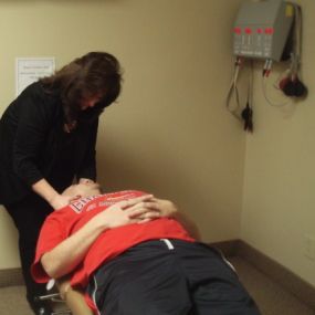 Dr. Helene Levinson, D.C. Adjusting a Patient