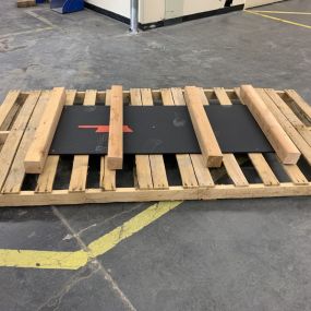 The beginning stage of a custom pallet which the item(s) will sit on top.