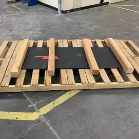 The beginning stage of a custom pallet which the item(s) will sit on top.