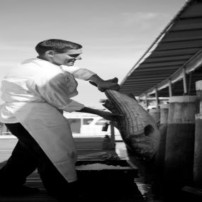 Chef with fresh fish at The Mooring