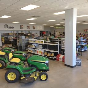 John Deere Lawnmowers parked near the RDO Equipment Co. part section