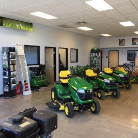 John Deere Lawnmowers parked in RDO Equipment Co. store showroom