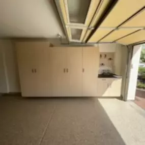 Cabinets With Work Bench Area And Slat Wall