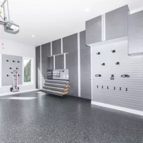 Transform your garage with custom cabinets designed for optimal storage and organization. Maximize space, reduce clutter, and create a clean, efficient environment tailored to your needs. Get professional garage organization solutions today