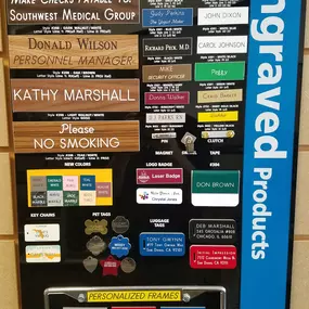 Engraved products including: name badges, name plates, pet tags, and license plate frames.