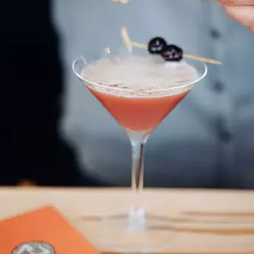 Bartender making cocktail at Bar 'Cino Brookline