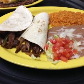 Tacos, burritos, and more are all on the menu at Acambaro Mexican Restaurant in Fayetteville, Arkansas! Wash it down with a cool drink from our full bar, or follow up with one of our succulent desserts