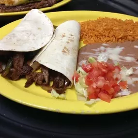 Tacos, burritos, and more are all on the menu at Acambaro Mexican Restaurant in Fayetteville, Arkansas! Wash it down with a cool drink from our full bar, or follow up with one of our succulent desserts