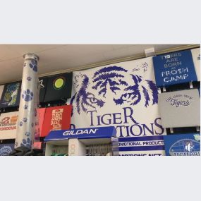 SECRET’S OUT! Inside there’s a division that can customize promotional products for your event or business. It’s called Tiger Promotions.