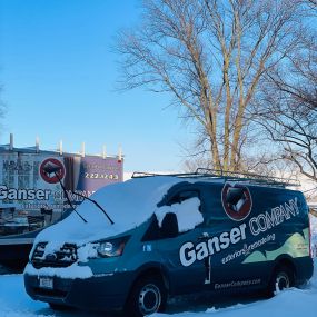 Our current work trucks after a snow storm in January 2024.