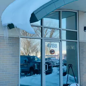 12 inches of snow has never looked so good! This is our office main entrance after a heavy winter storm in January of 2024.