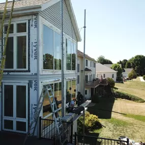 Utilizing our new lifter to install some Infinity from Marvin Windows. Turned out to be such a beautiful day for a full window replacement.