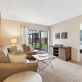 Spacious living room with patio access