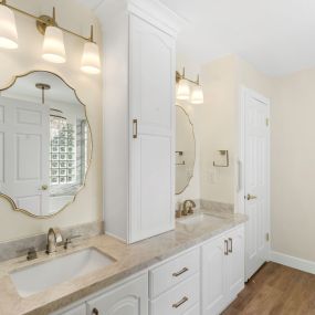 Master bathroom including new cabinets, countertops, faucets, mirrors, vanity lights, flooring, paint, etc.