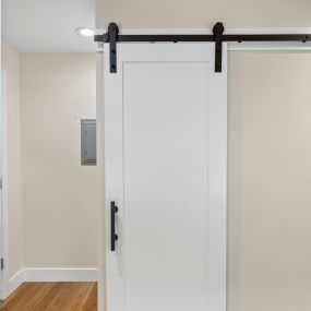 New barn door installed for existing closet space.