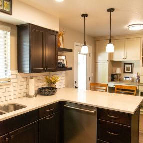 New cabinetry, subway backsplash tile, new countertops, new pendants