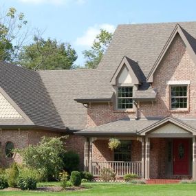 Nice exterior of a home in MN with new roofing, siding, and windows. Construction by Younger Exteriors.