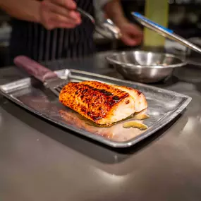 Fish being prepared at Lionfish, the best seafood in Gaslamp.