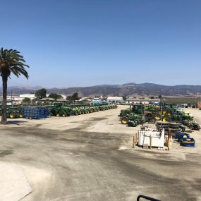 Rows of John Deere tractors at RDO Equipment Co. in Salinas, CA