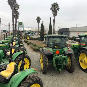 Rows of John Deere large-frame and specialty tractors at RDO Equipment Co. in Salinas, CA