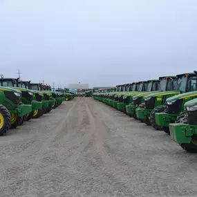 Rows of John Deere large-frame tractors at RDO Equipment Co. in Salinas, CA