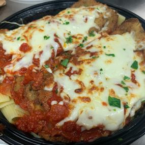 Eggplant Parmigiana Dinner for 2 ????

Includes your choice of House or Caesar Salad & Garlic knots for $20!
