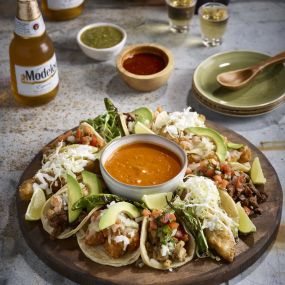 TACO SAMPLER: Give each of our specialty tacos a try! They come with a side of guacamole and your choice of salsa.