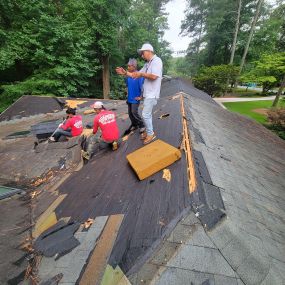 Removing all layers down to a clean deck.