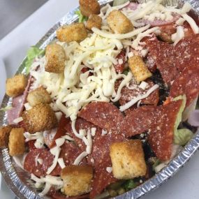 A small fresh and delicious Chef salad piled high with veggies, ham, pepperoni, bacon and cheese!