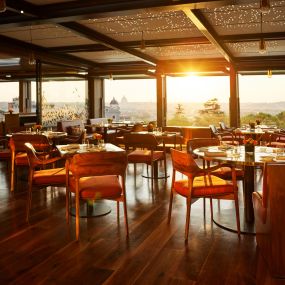 Il Giardino Ristorante main dining area with view over Rome at sunset