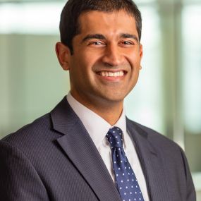 Rishi Oza, Partner at Robert Brown LLC