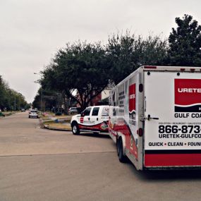 URETEK residential foundation repair truck in Houston neighborhood