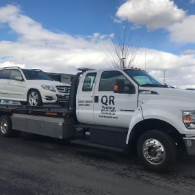QR Towing LLC is your professional tow service in Utah. Whether you are looking for a regular towing or a wrecker service, we are fully equipped and experienced with a variety of vehicles and situations. We offer cheap towing, fast service, and a high level of professionalism. When you choose QR Towing LLC, you can always be sure that you’re choosing the best.  Light and Medium Duty Towing  We offer both light-duty towing and medium-duty towing services all throughout Utah.  Flatbed and Roll-Off