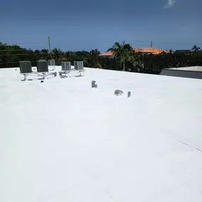 Roof Coating Applied to Flat Roof