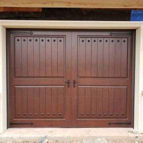 Beautiful Faux Wood Stained Garage Doors Being Installed