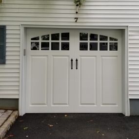 Garage Door PR12-A with Curved Windows and Decorative Handles