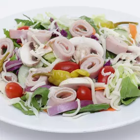 CHEF SALAD - Iceberg & romaine mix with tomatoes, mushrooms, red onions, cucumber, pepperoncini peppers, ham, turkey & mozzarella cheese.