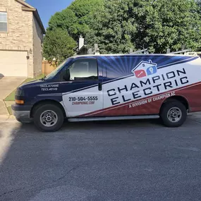 Champion Home Services work van in field