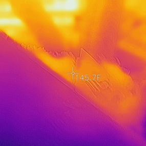 Infra Red image of interior of attic that is under ventilated