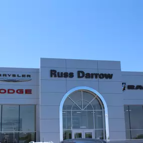 Russ Darrow Metro Chrysler Dodge Jeep RAM front of building.