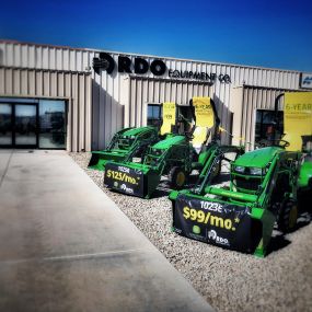 John Deere utility tractors parked outside RDO Equipment Co.