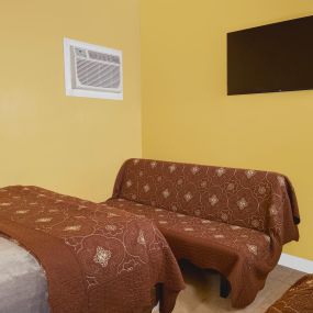 Standard Two Queen Beds + Sofa Bed